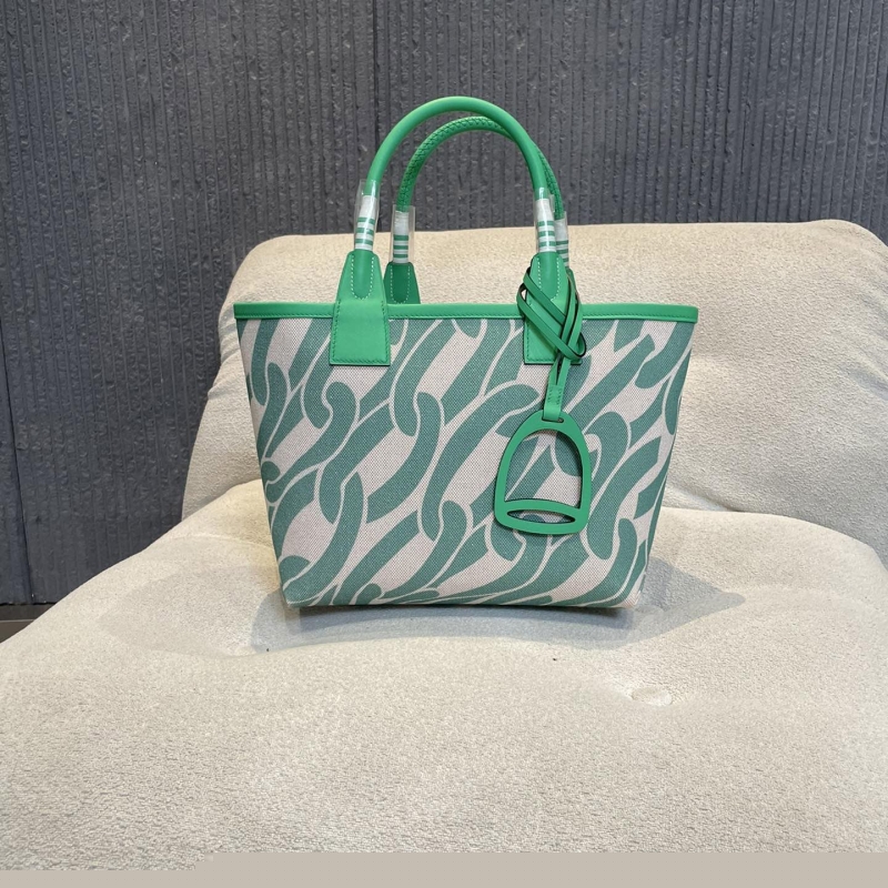H**mes shopping bags